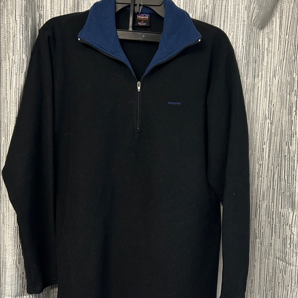 Patagonia woman’s Black and Navy Zip-Up Sweater